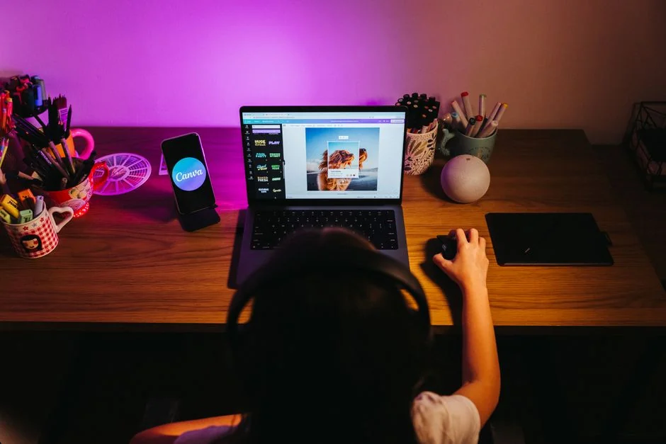 A clean and modern workspace featuring a laptop, tablet, smartphone, and monitor. Ideal for remote work and tech setups.